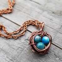 Nestling Necklace with Blue Stones